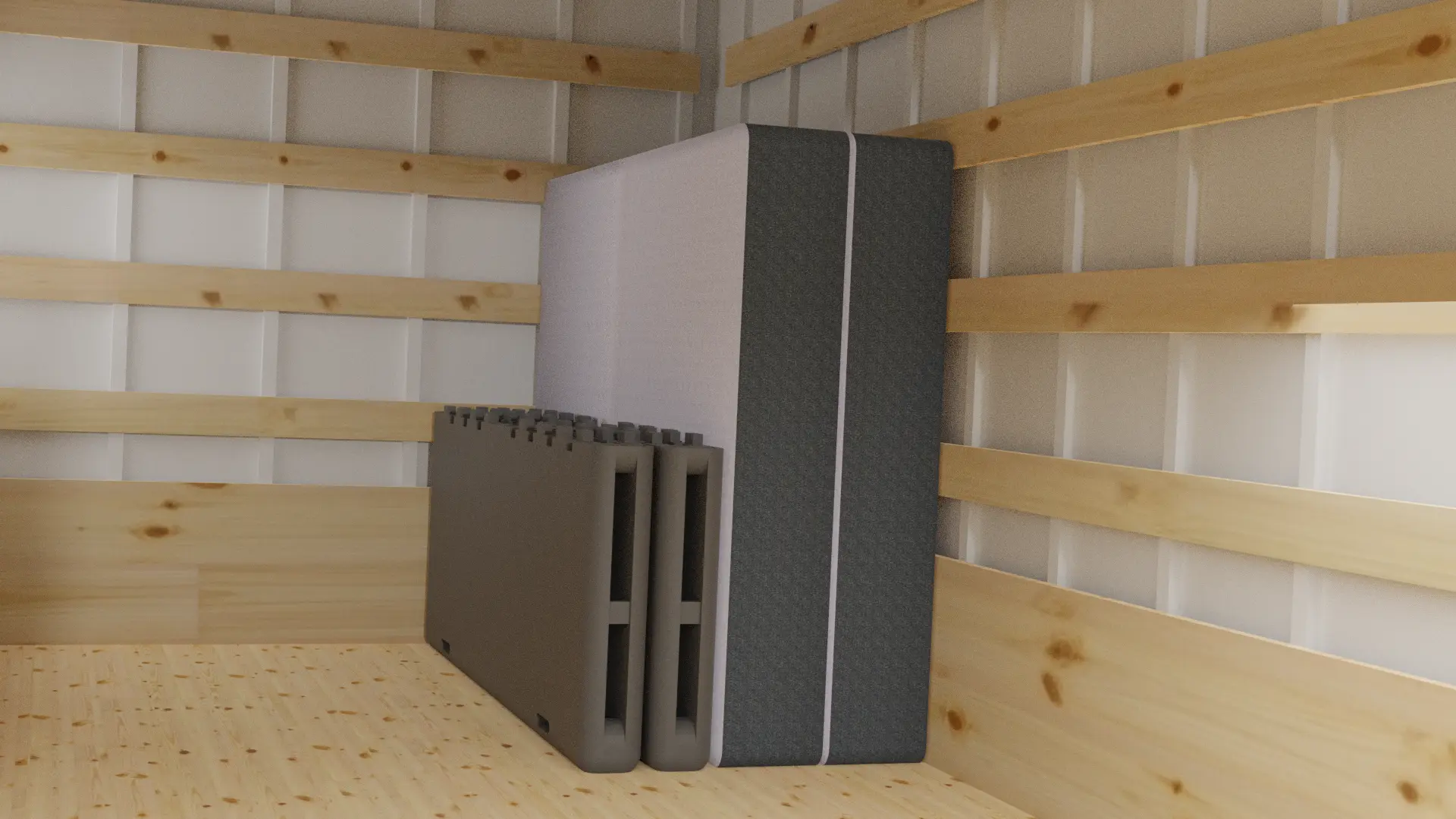 A trailer interior showing two standard Queen mattresses beside two StageForm Queen platforms broken down flat.